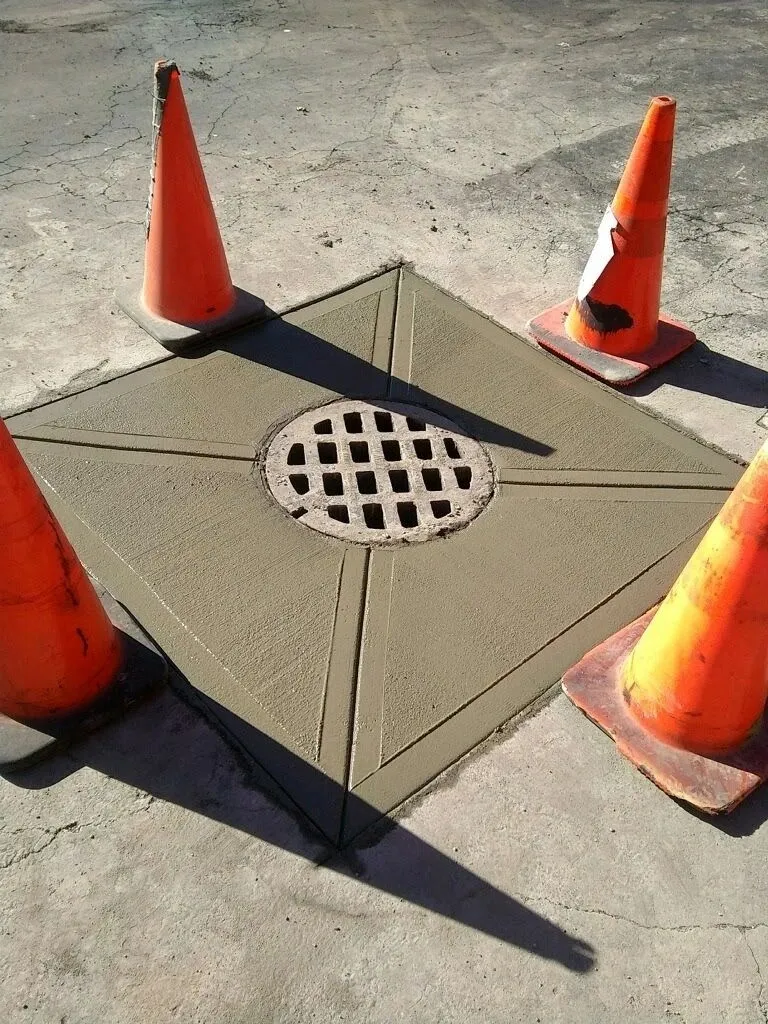 Concrete set around a manhole