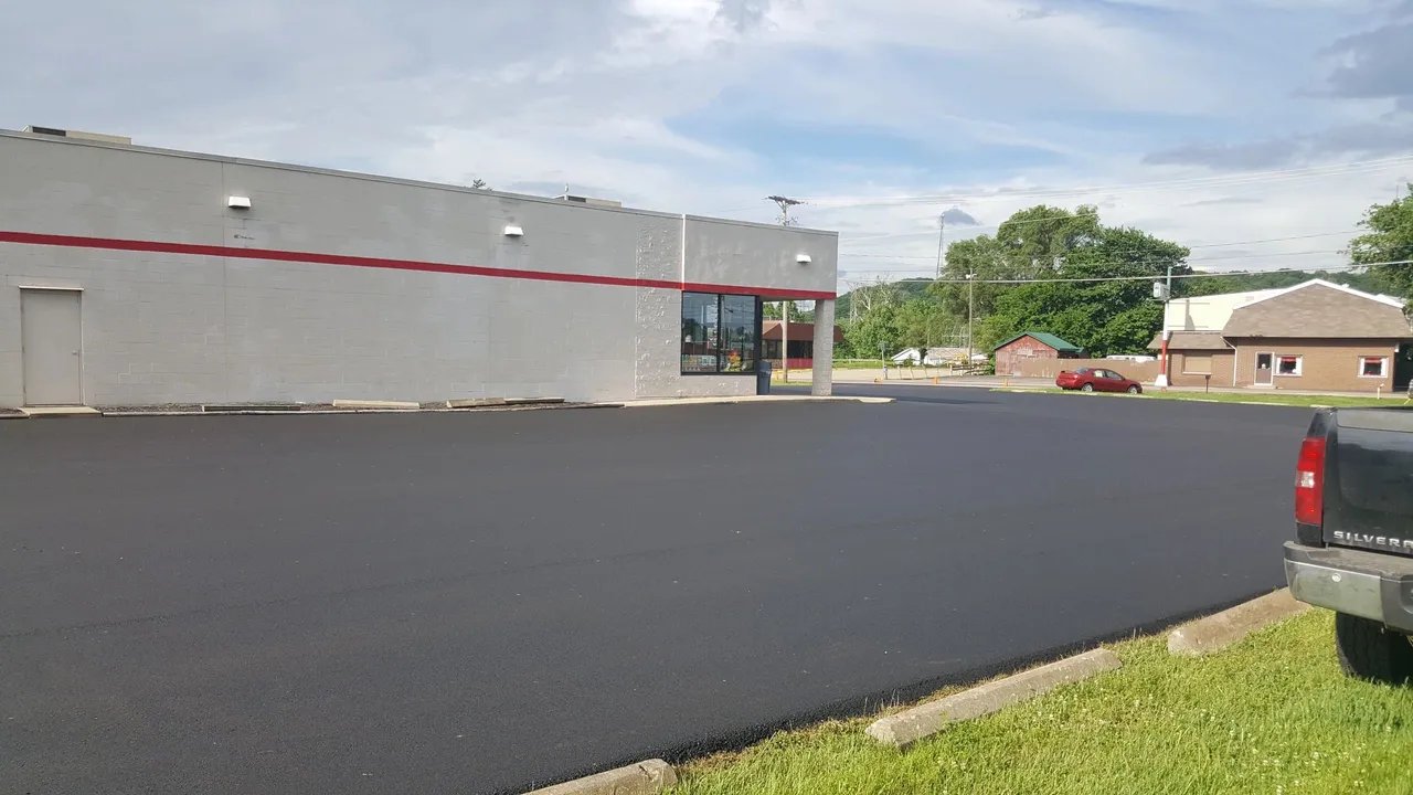 Freshly paved parking lot at a shopping center